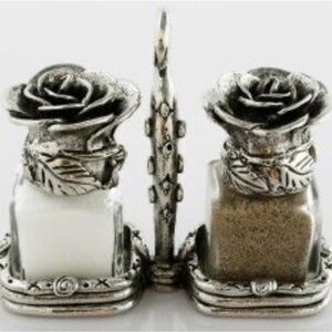 Vintage pewter rose salt and pepper shakers with stand.